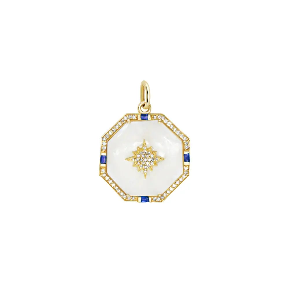 Blue sapphire and diamond starburst pendant in 14K yellow gold by JJ Jewelry