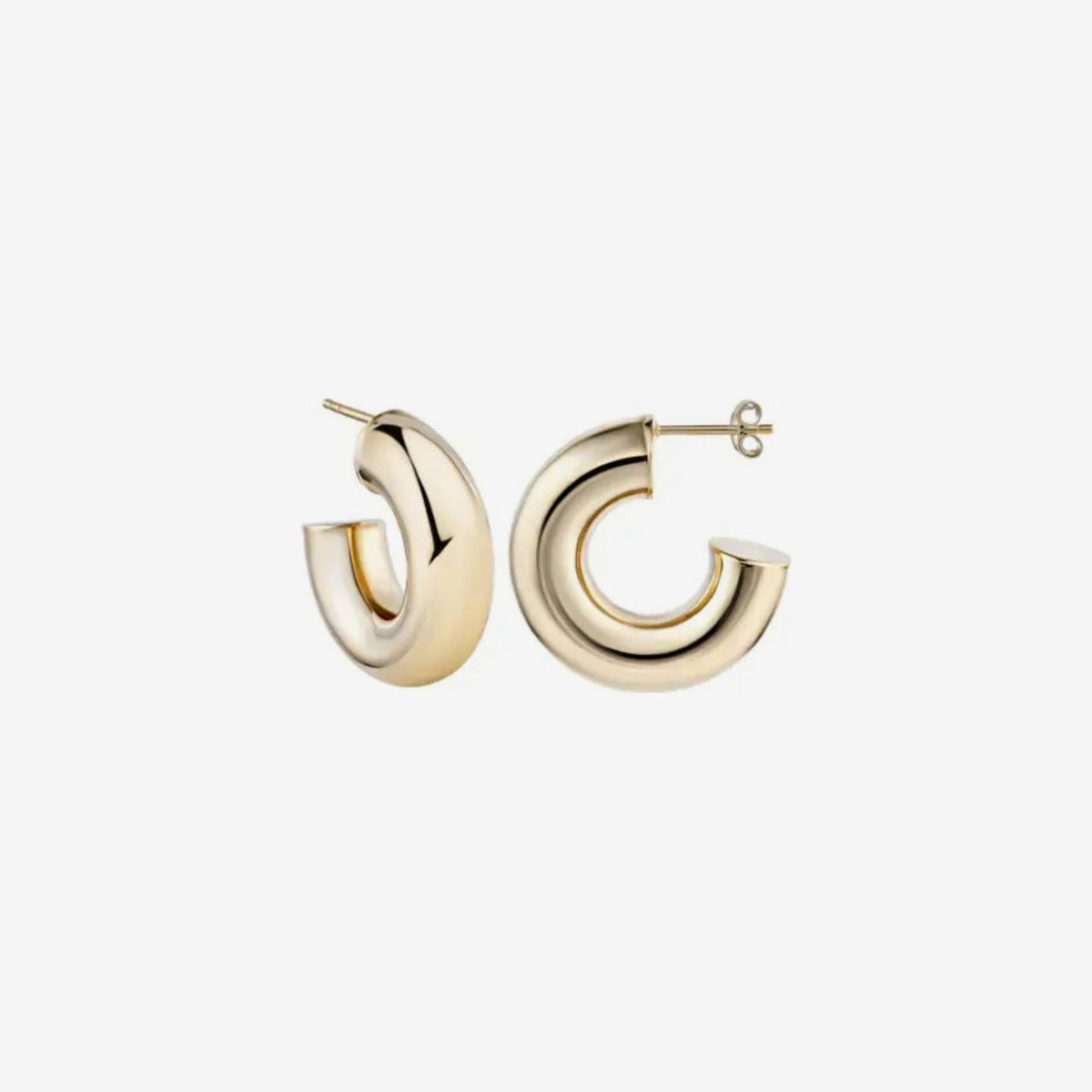 Domed Hoop Earrings in 14K Yellow Gold, gray background | JJ Jewelry Miami