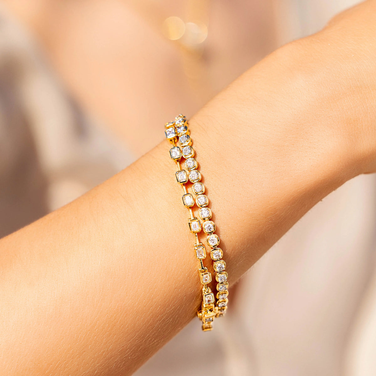 Emerald-Cut Diamond Spaced Bracelet in Yellow Gold, lifestyle view 2 | JJ Jewelry