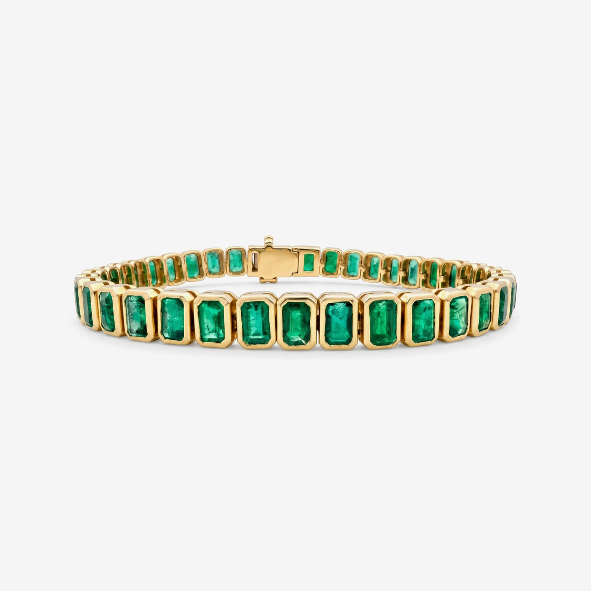 Emerald-Cut Emerald Bezel Tennis Bracelet in Yellow Gold, lifestyle view 1 | JJ Jewelry