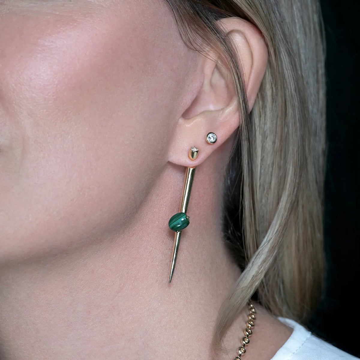 Malachite Martini Spike Earrings in 18K Yellow Gold, on ear | JJ Jewelry Miami