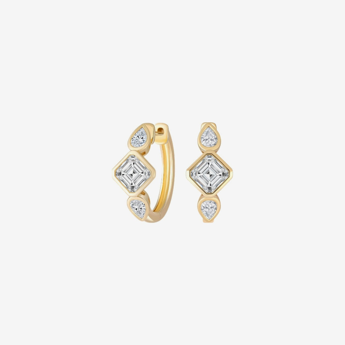 Multi-Shape Diamond Huggie Earrings in 18K Yellow Gold, gray background | JJ Jewelry Miami