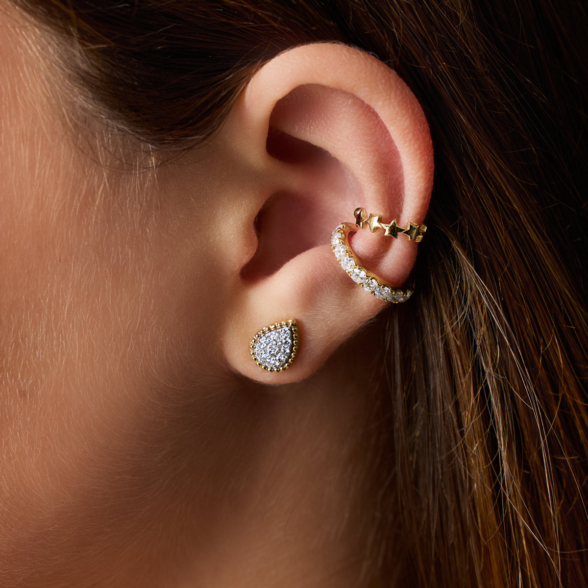 Teardrop Diamond Halo Stud Earrings styled with Nine Diamond Ear Cuffs, on ear | JJ Jewelry Miami