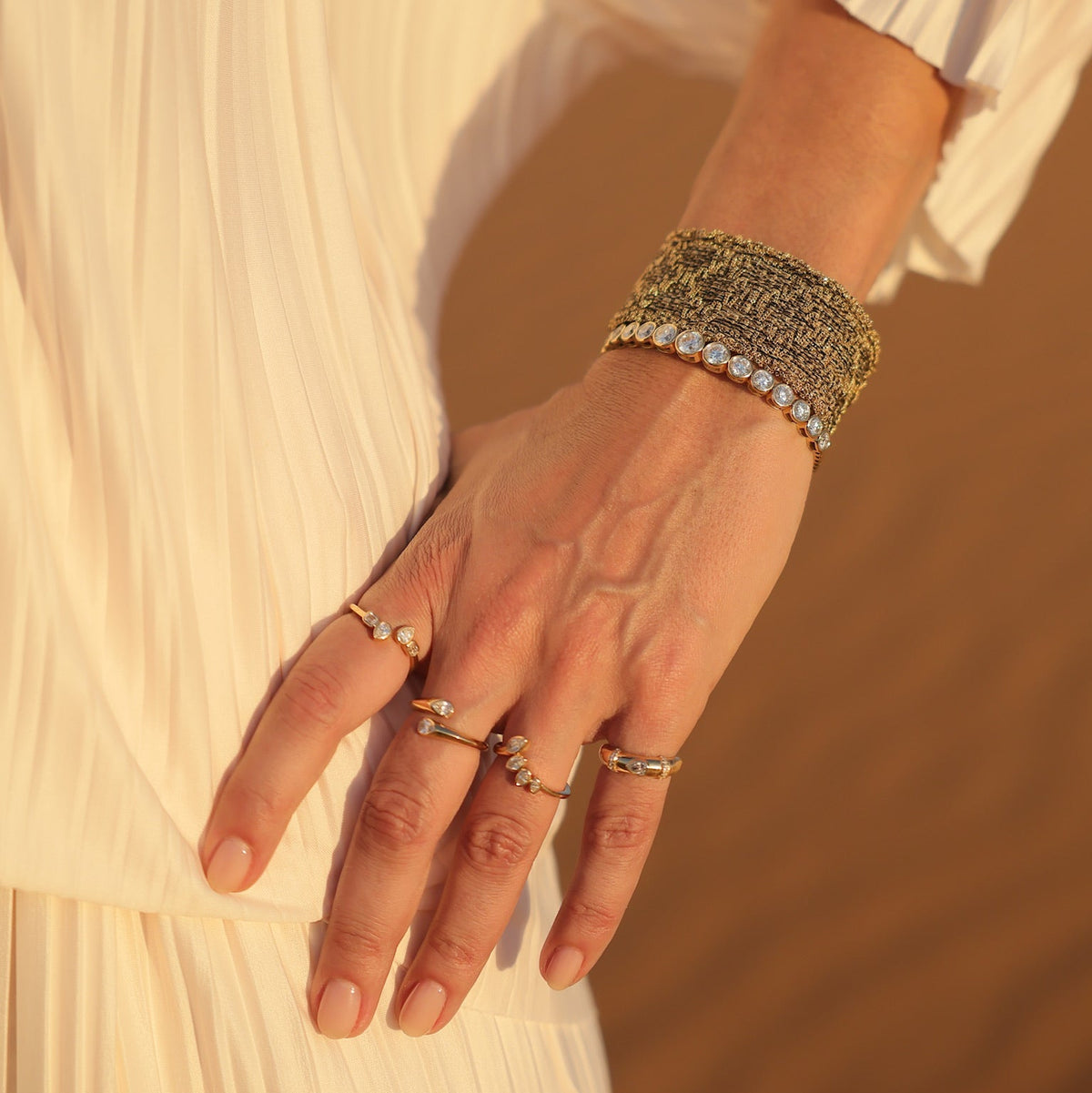Open Bezel Pear and Emerald-Cut Diamond Ring in 18K Gold | JJ Jewelry Miami
