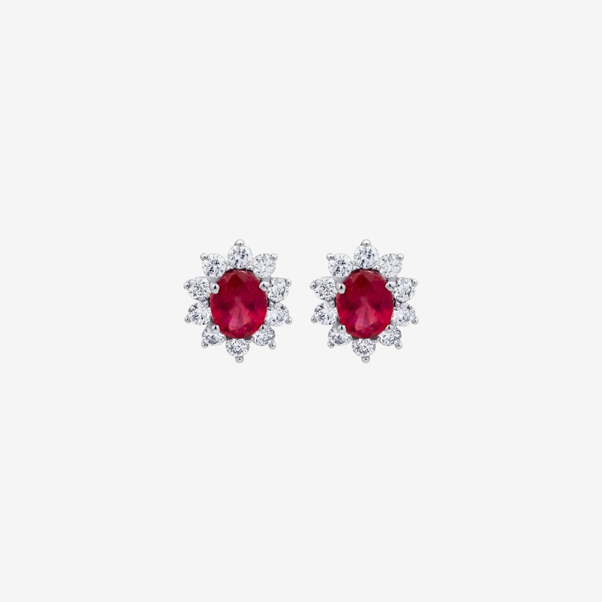 Oval Gemstone and Diamond Halo Stud Earrings in 18K White Gold with Garnet, gray background | JJ Jewelry Miami