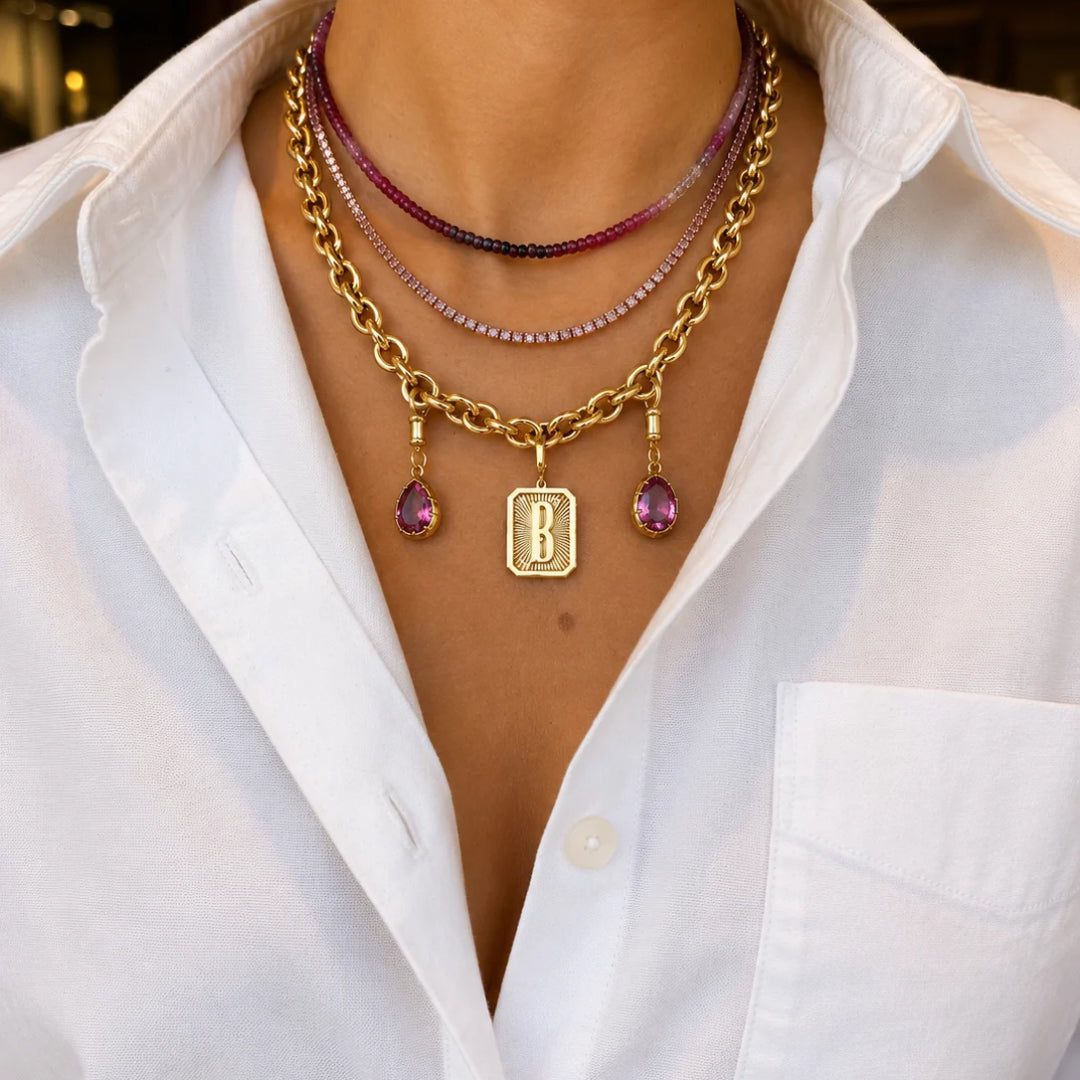 Pink Sapphire Tennis Necklace in 14K Rose Gold layered on model | JJ Jewelry Miami