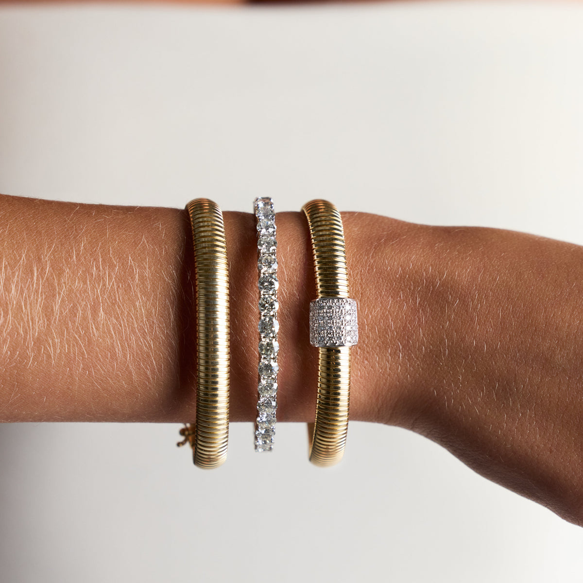 Round Brilliant Diamond Flexible Tennis Bangle in White Gold, lifestyle view 1 | JJ Jewelry