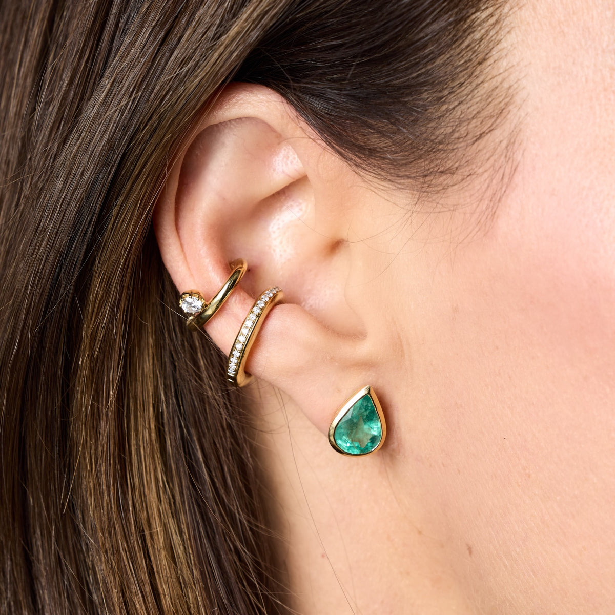 Single Diamond Ear Clip in 18K Gold, styled ear stack | JJ Jewelry Miami