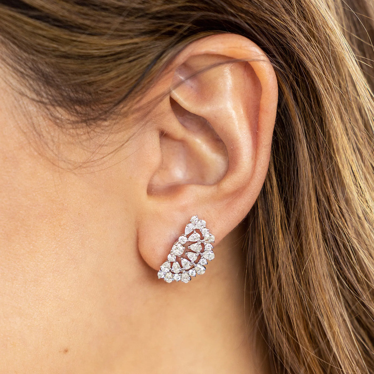 Tessen Fan Diamond Earrings in 18K White Gold, on ear | JJ Jewelry Miami