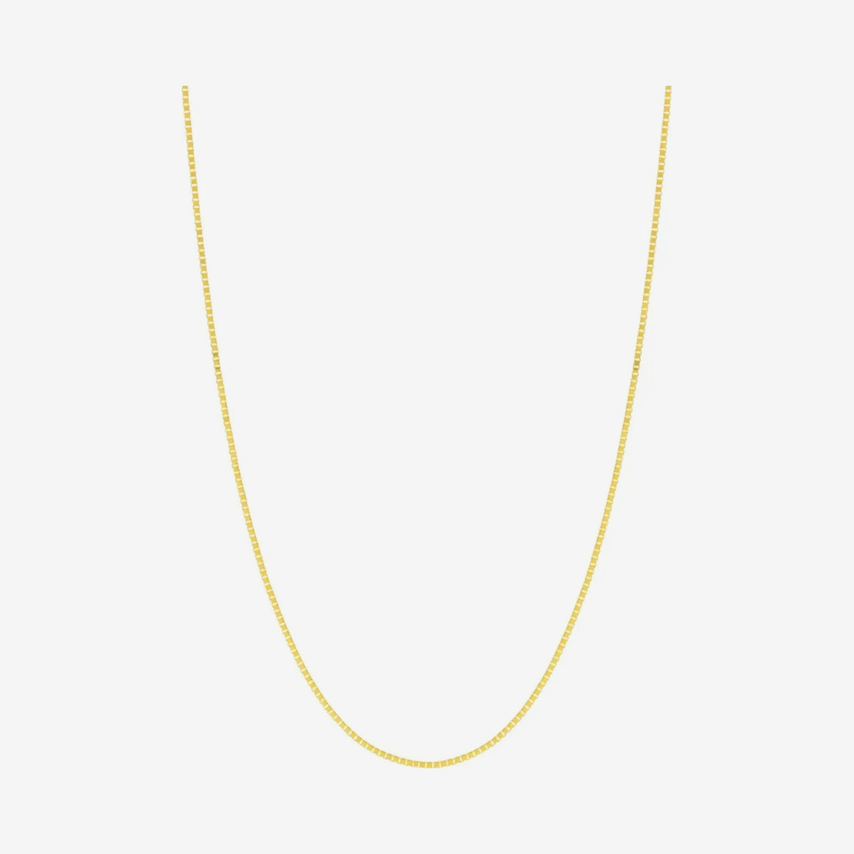 Adjustable Box Chain Necklace in 14K Yellow Gold, gray background | JJ Jewelry Miami