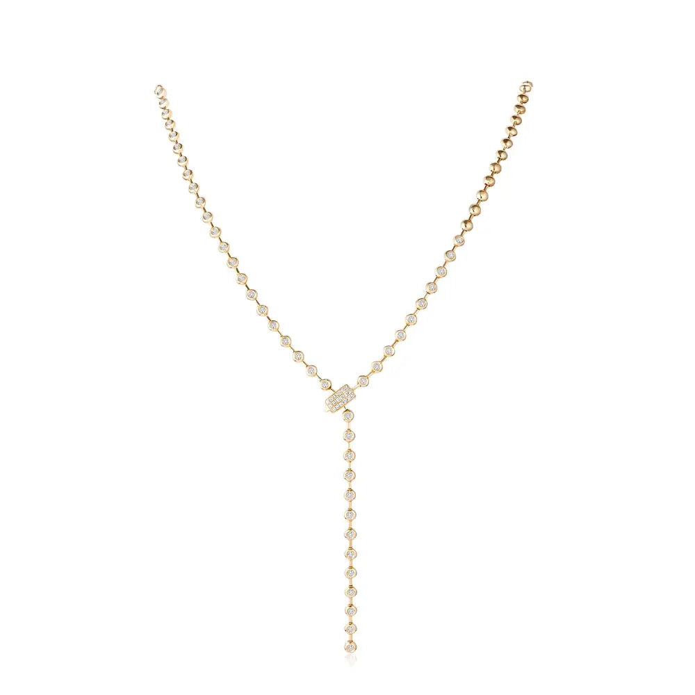 Bezel-set diamond lariat necklace in 18K yellow gold by JJ Jewelry