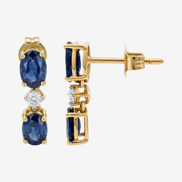 Blue Sapphire and Diamond Drop Earrings in 14K Yellow Gold, gray background | JJ Jewelry Miami