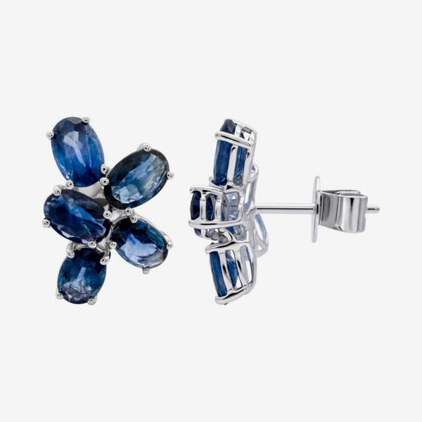 Blue Sapphire Flower Cluster Earrings in 18K White Gold, gray background | JJ Jewelry Miami