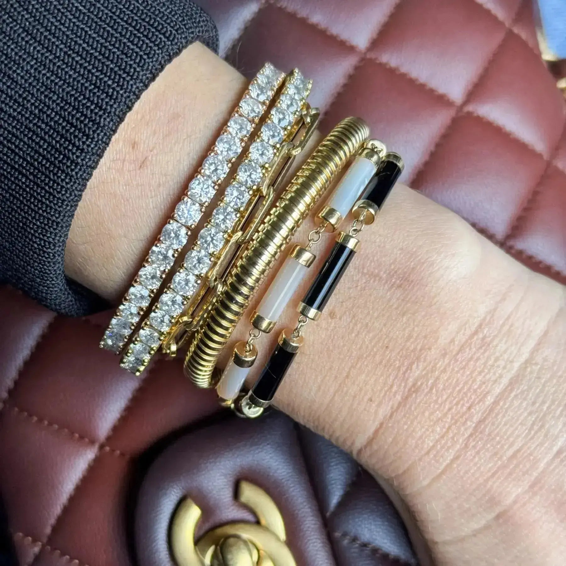 14K yellow gold bracelet with cylindrical gemstone links