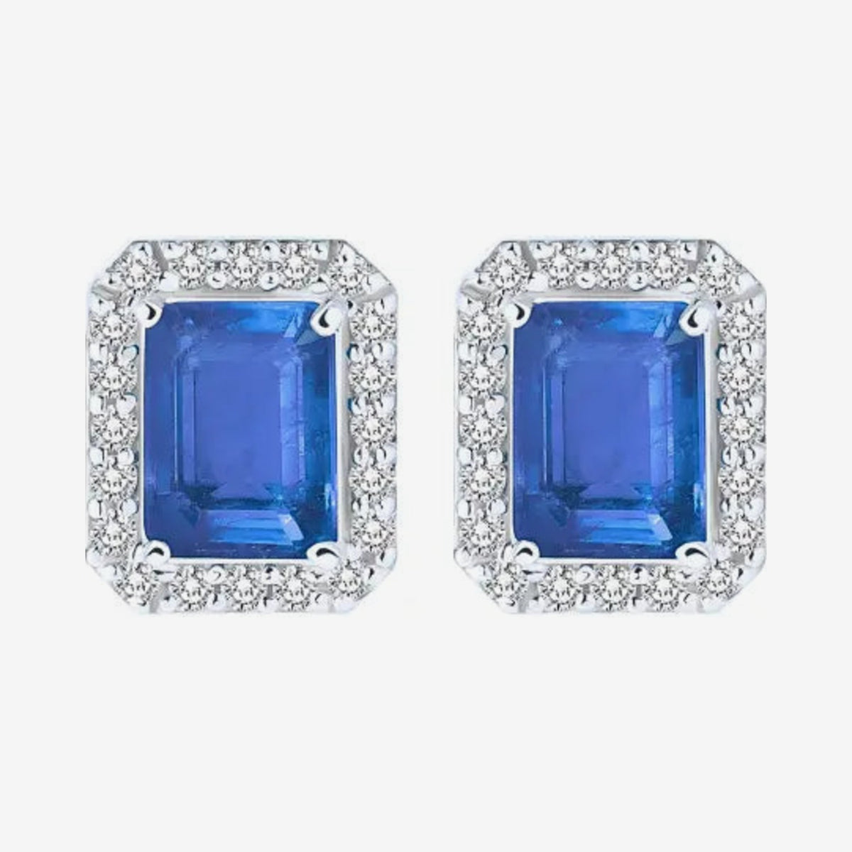 Gemstone and Diamond Halo Stud Earrings in 18K White Gold with Tanzanite, gray background | JJ Jewelry Miami
