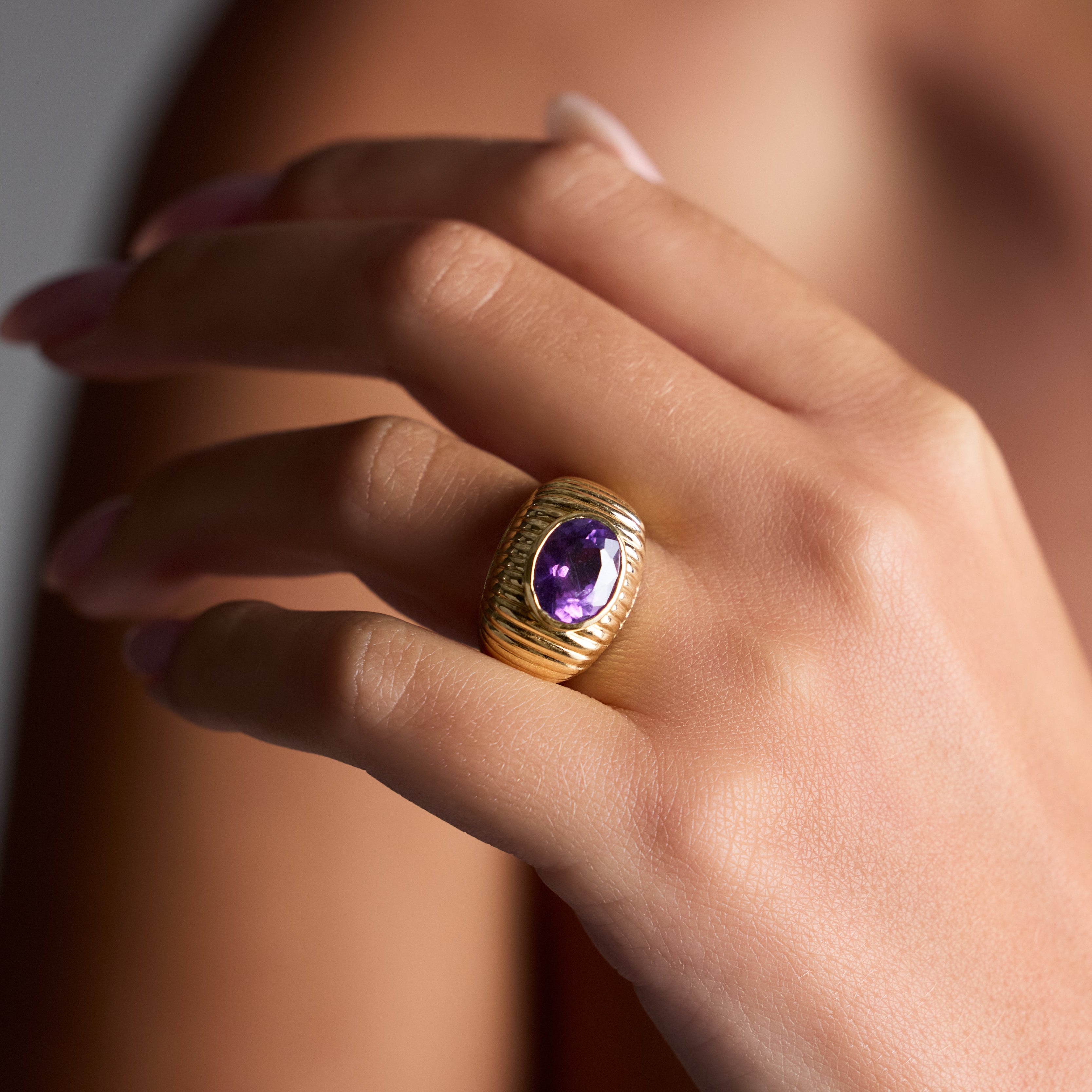 Oval amethyst bezel-set gemstone ring by JJ Jewelry
