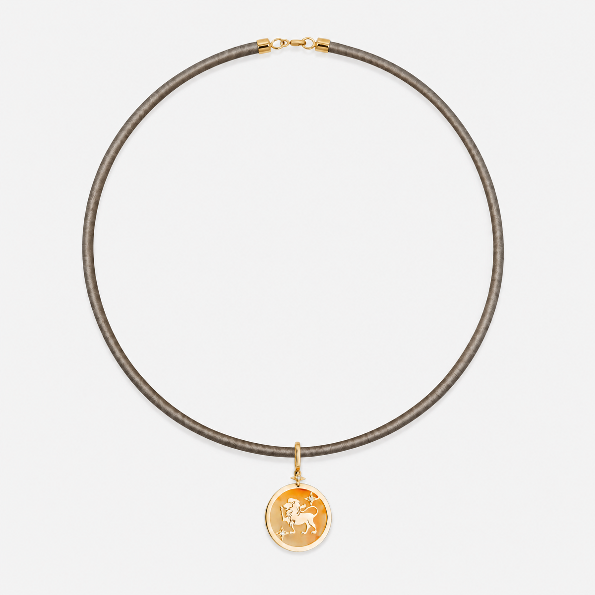 Leo Zodiac Pendant in 18K Yellow Gold with Orange Quartz & Diamonds, styled on a taupe cord choker | JJ Jewelry Miami
