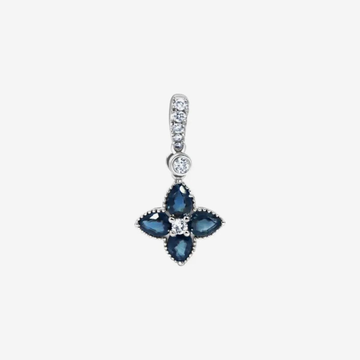 Mini Gemstone Flower Pendant with Diamonds in 18K White Gold, Blue Sapphire, gray background | JJ Jewelry Miami