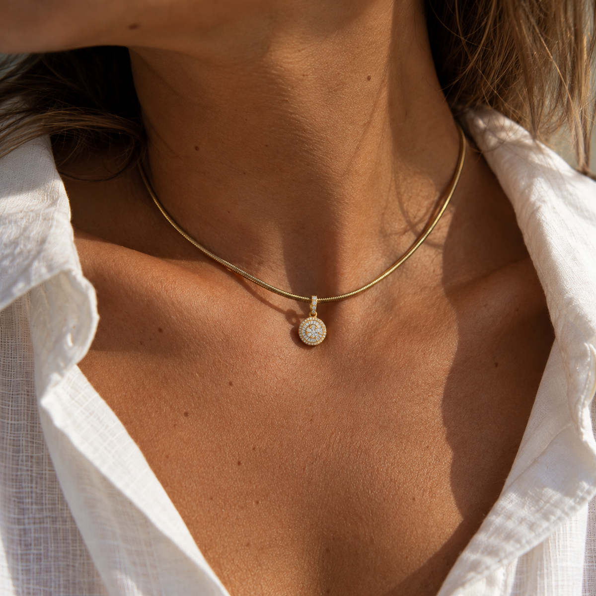 Mini Round Diamond Cluster Pendant in 18K Yellow Gold, worn on a fine gold chain | JJ Jewelry Miami