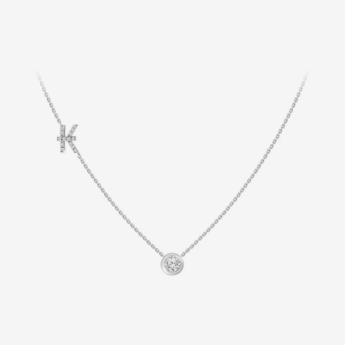 Pavé Diamond Initial Necklace, Letter K, in 18K White Gold, gray background | JJ Jewelry Miami