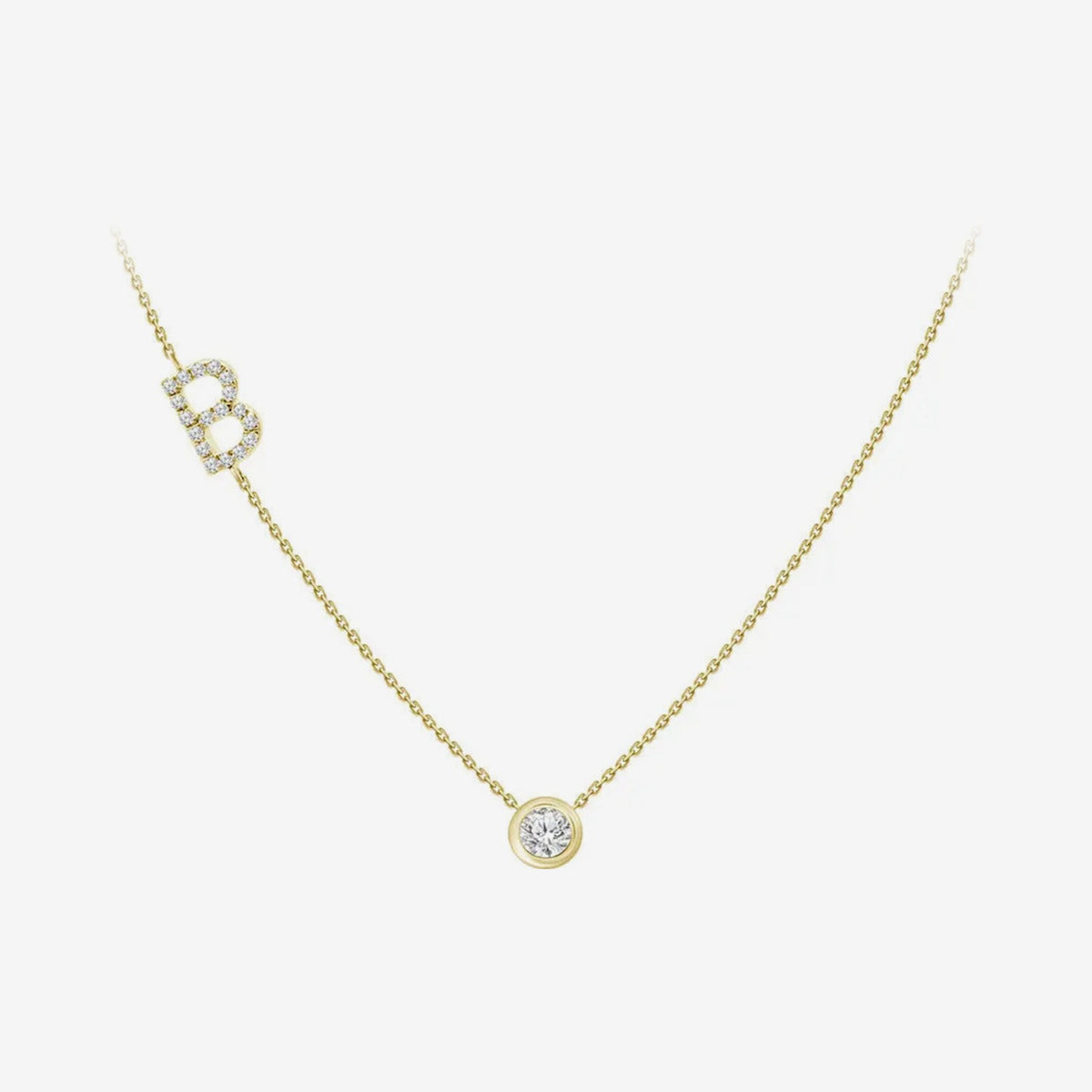 Pavé Diamond Initial Necklace, Letter B, in 18K Yellow Gold, gray background | JJ Jewelry Miami