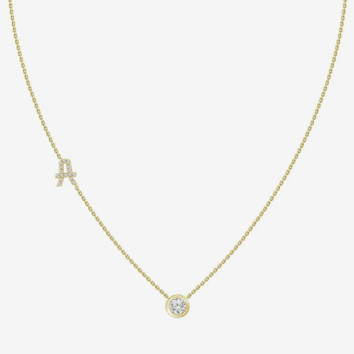 Pavé Diamond Initial Necklace, Letter A, in 18K Yellow Gold, gray background | JJ Jewelry Miami