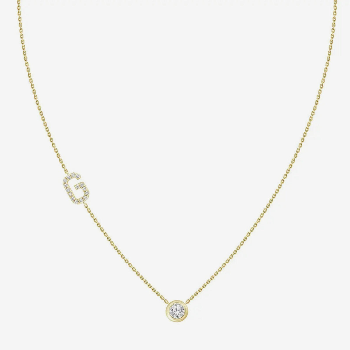 Pavé Diamond Initial Necklace, Letter G, in 18K Yellow Gold, gray background | JJ Jewelry Miami