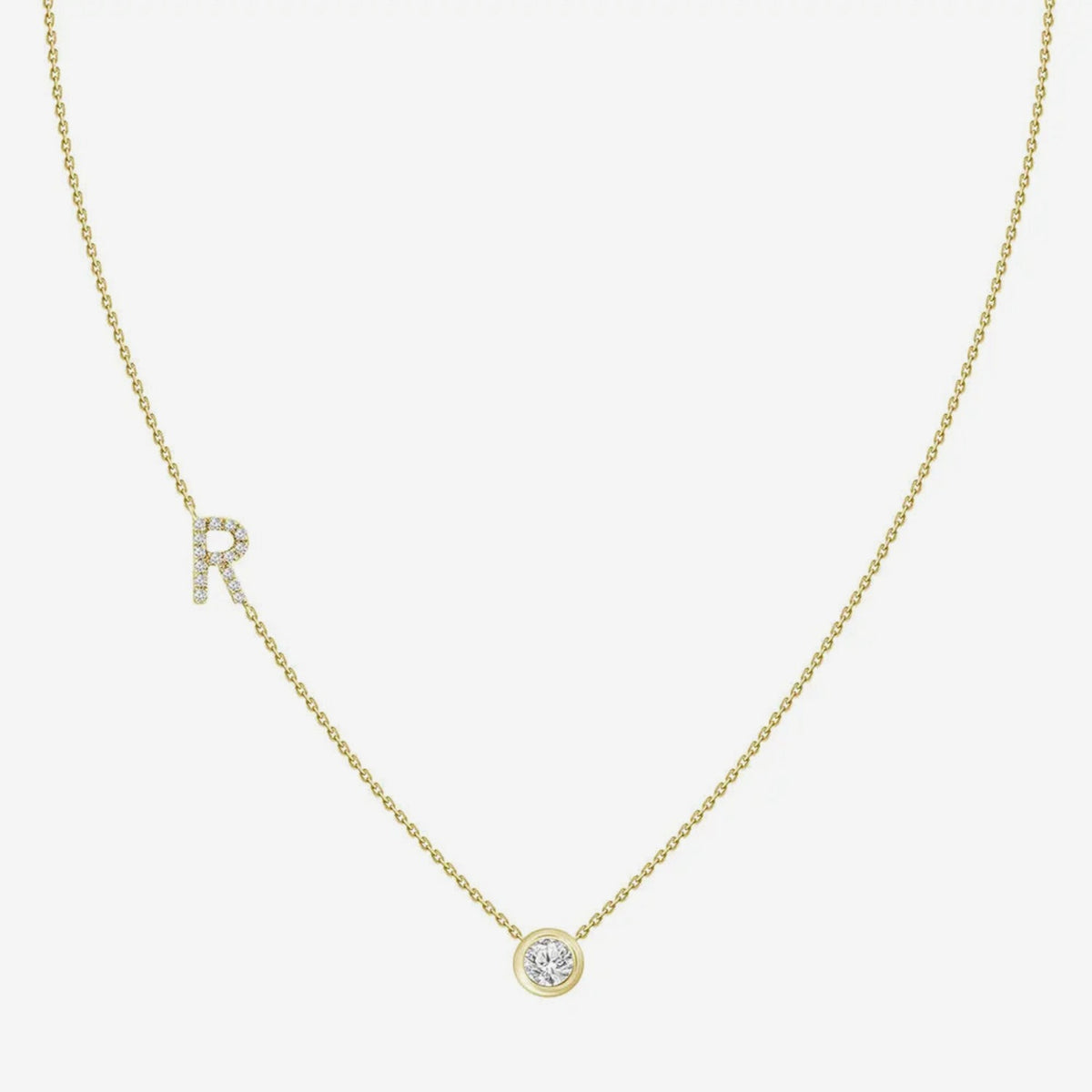 Pavé Diamond Initial Necklace, Letter R, in 18K Yellow Gold, gray background | JJ Jewelry Miami