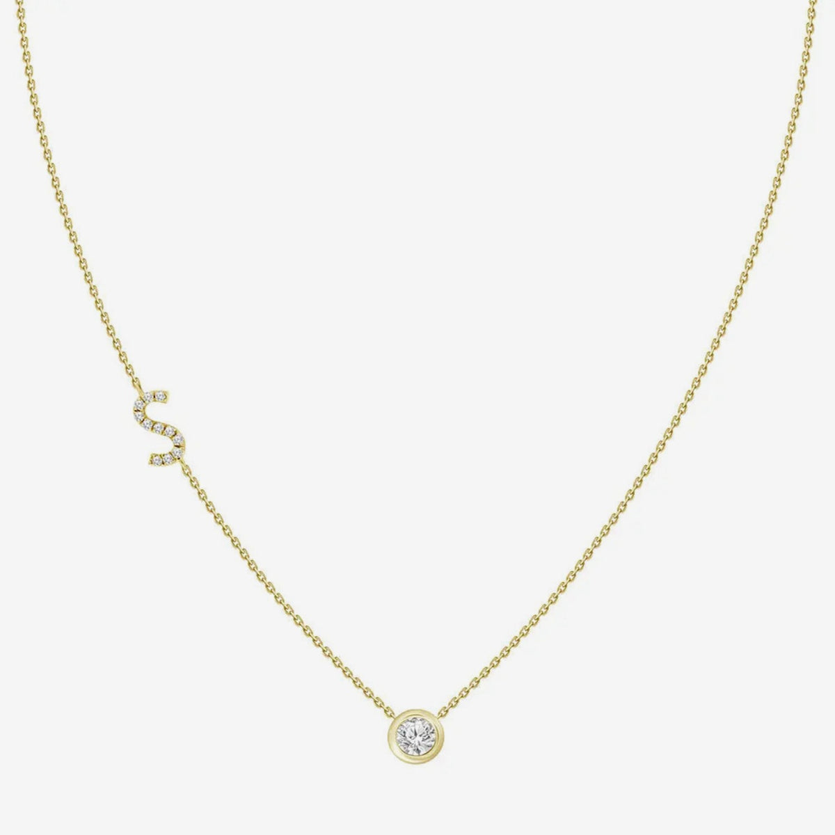 Pavé Diamond Initial Necklace, Letter S, in 18K Yellow Gold, gray background | JJ Jewelry Miami