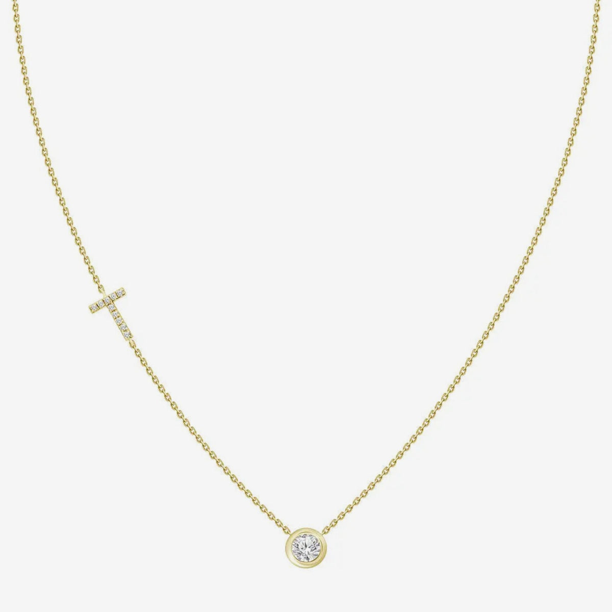 Pavé Diamond Initial Necklace, Letter T, in 18K Yellow Gold, gray background | JJ Jewelry Miami
