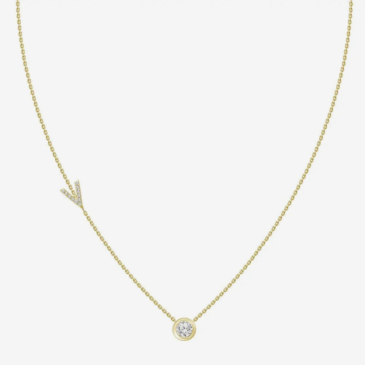Pavé Diamond Initial Necklace, Letter V, in 18K Yellow Gold, gray background | JJ Jewelry Miami