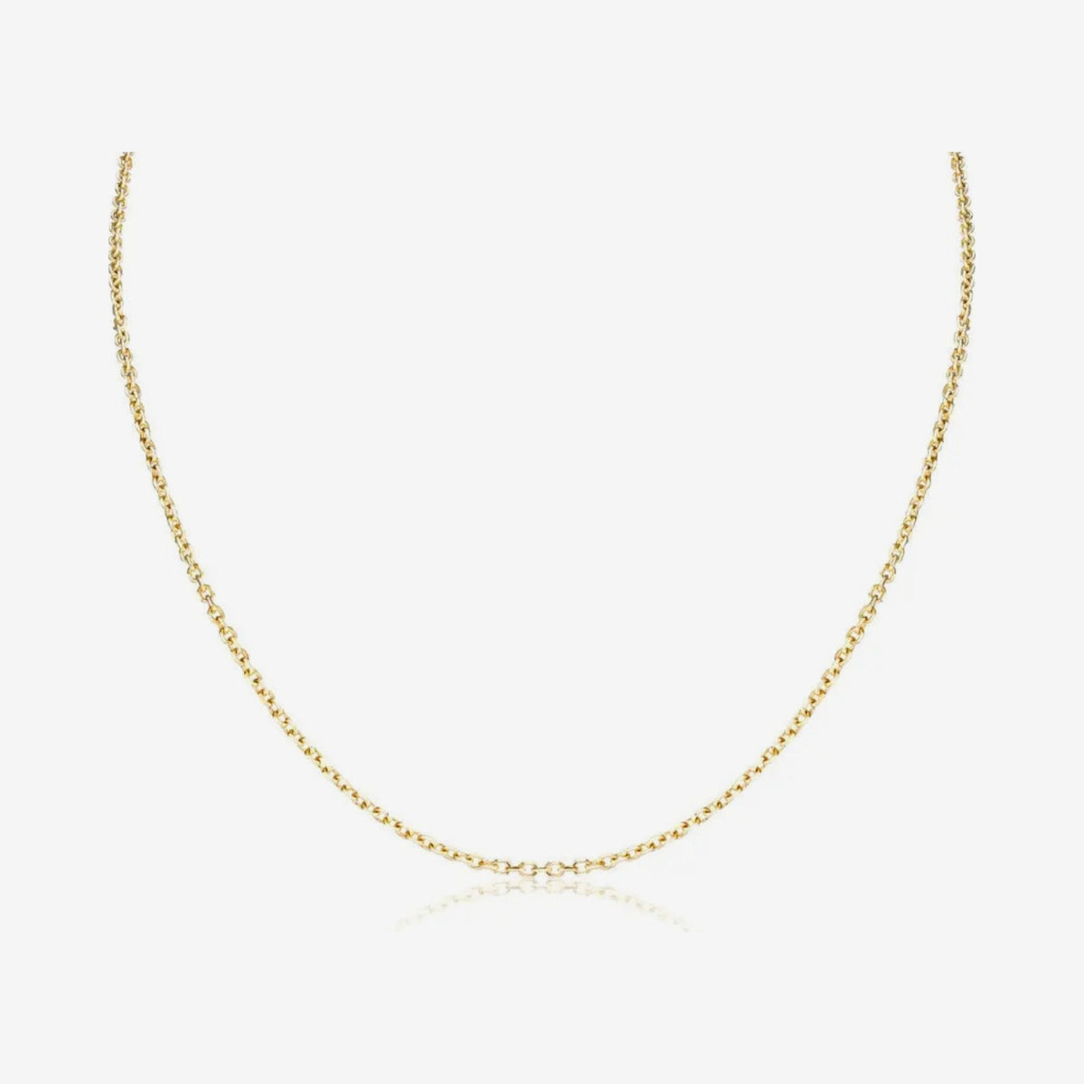 Petite Cable Chain Necklace in 14K Yellow Gold, gray background | JJ Jewelry Miami