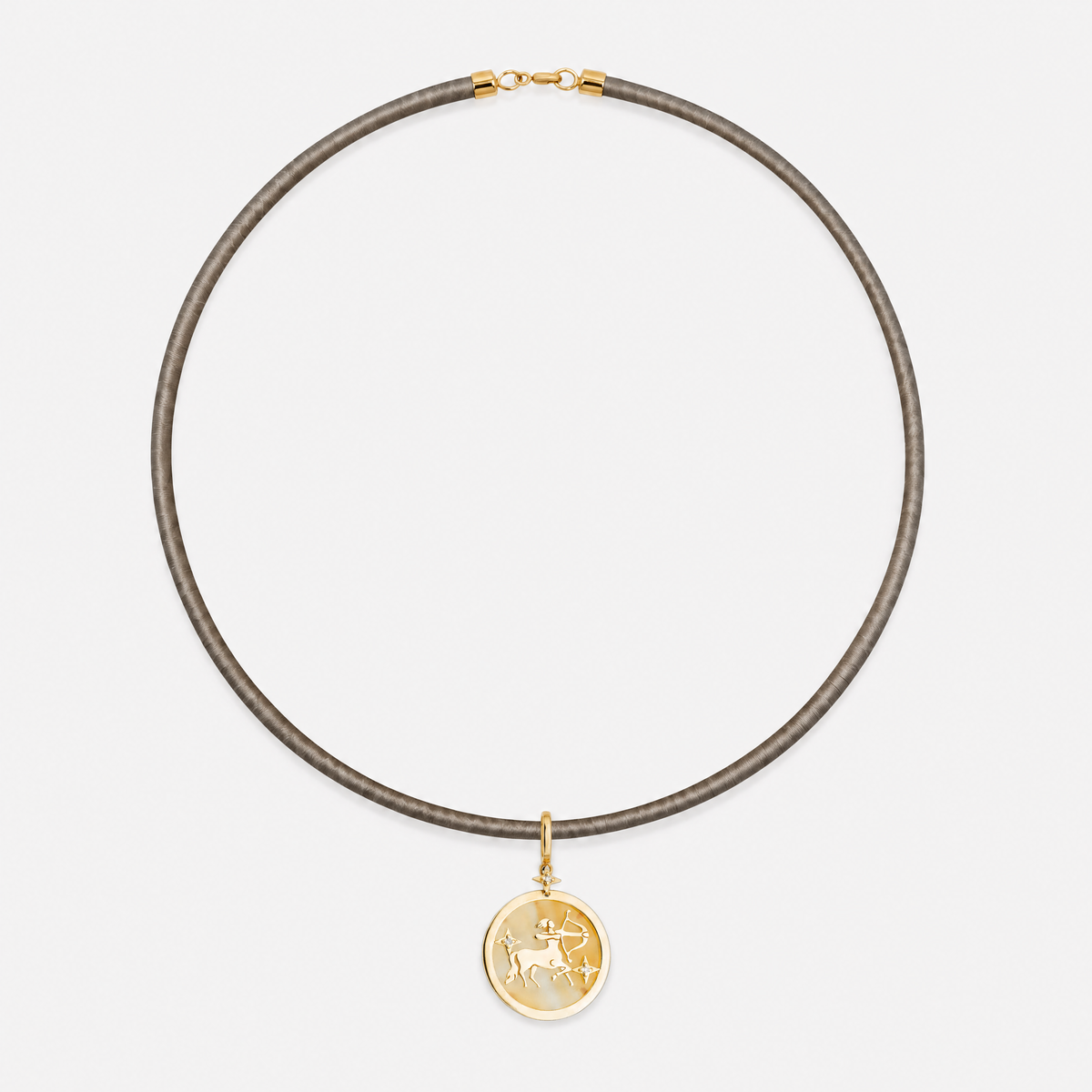 Sagittarius Zodiac Pendant in 18K Yellow Gold with Orange Quartz & Diamonds, styled on a taupe cord choker | JJ Jewelry Miami