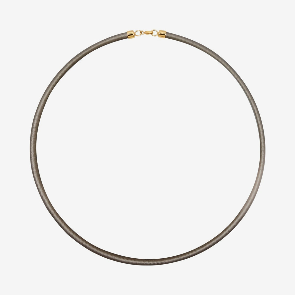 Silk Cord Necklace with 18K Yellow Gold Clasp, Green, gray background | JJ Jewelry Miami