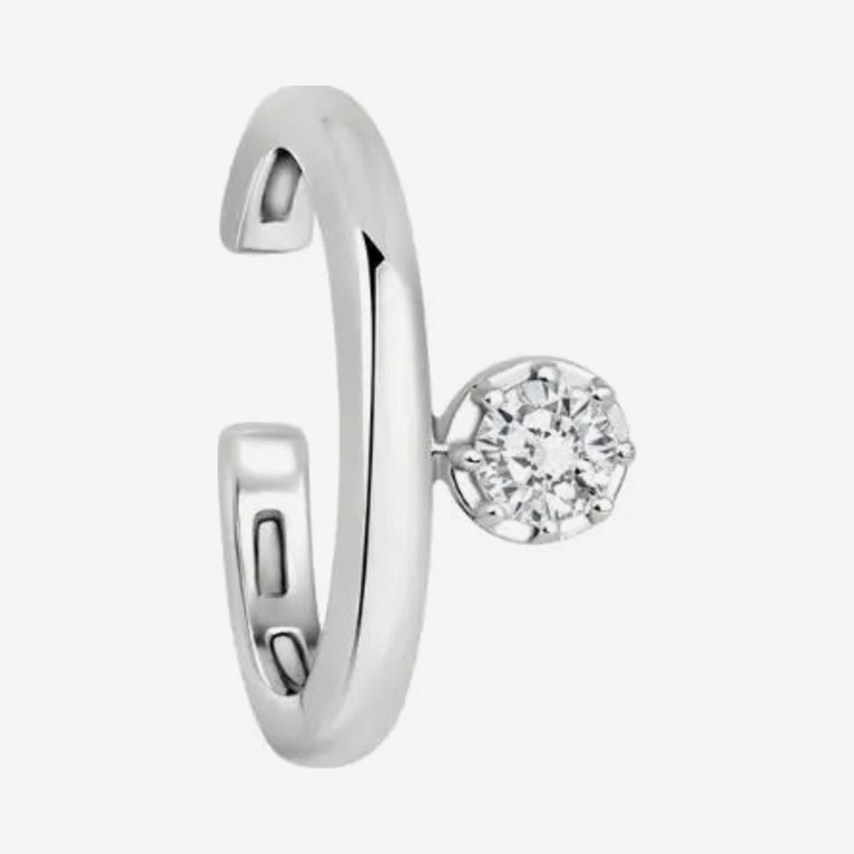 Single Diamond Ear Clip in 18K White Gold, gray background | JJ Jewelry Miami