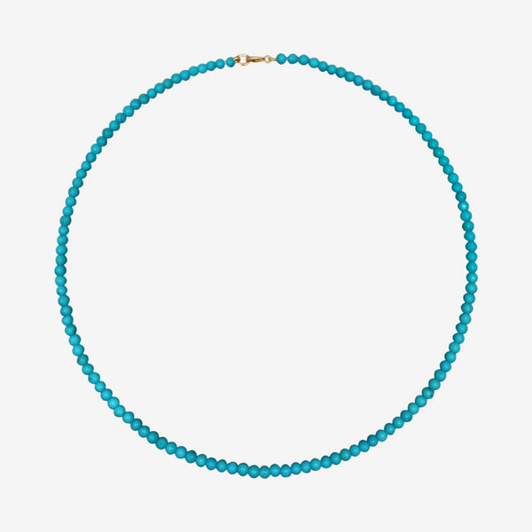 Turquoise Bead Necklace with 14K Yellow Gold clasp, gray background | JJ Jewelry Miami