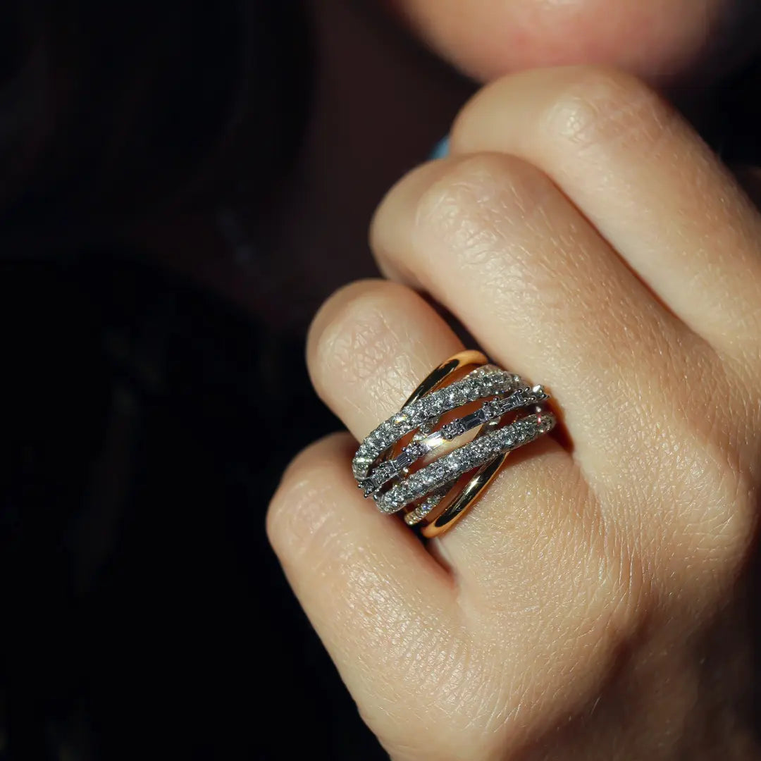 Two-tone gold ring with pavé diamonds crossover design