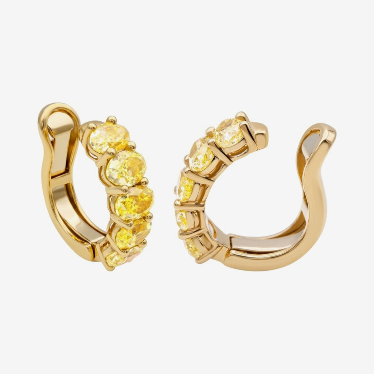 Yellow Diamond Ear Cuff in 18K Yellow Gold, gray background | JJ Jewelry Miami