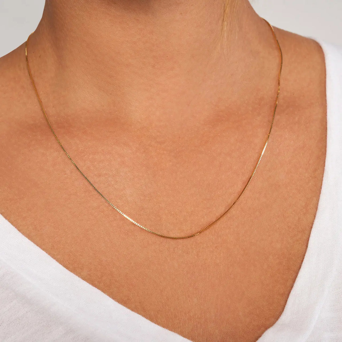 Adjustable Box Chain Necklace in 14K Yellow Gold, on model | JJ Jewelry Miami