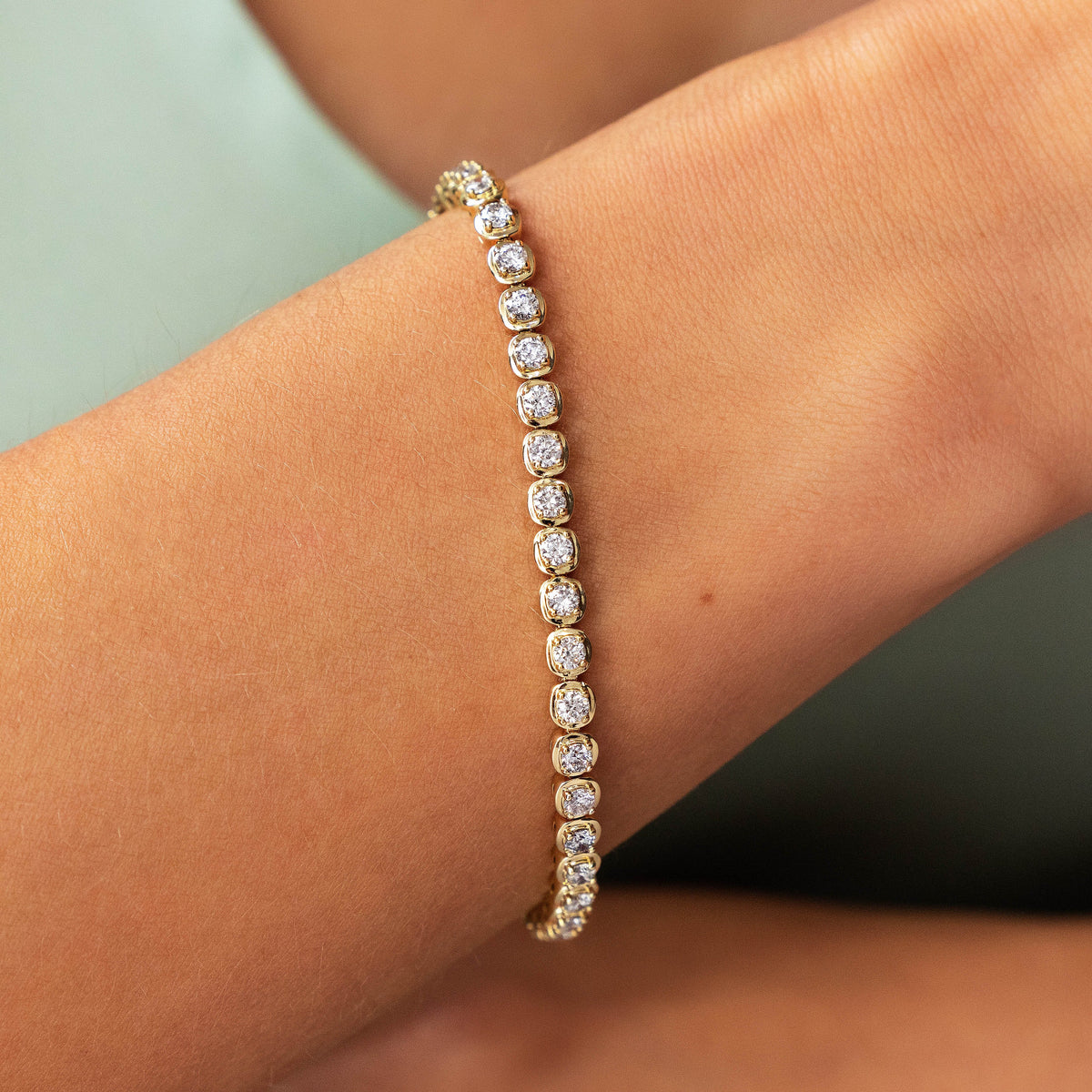 Bezel-Set Round Diamond Line Bracelet in Yellow Gold, lifestyle view 1 | JJ Jewelry