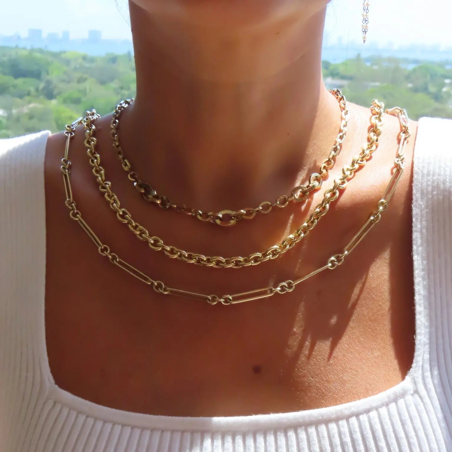 Close-up of a person wearing Hollow Round Yellow Gold Chain Necklace