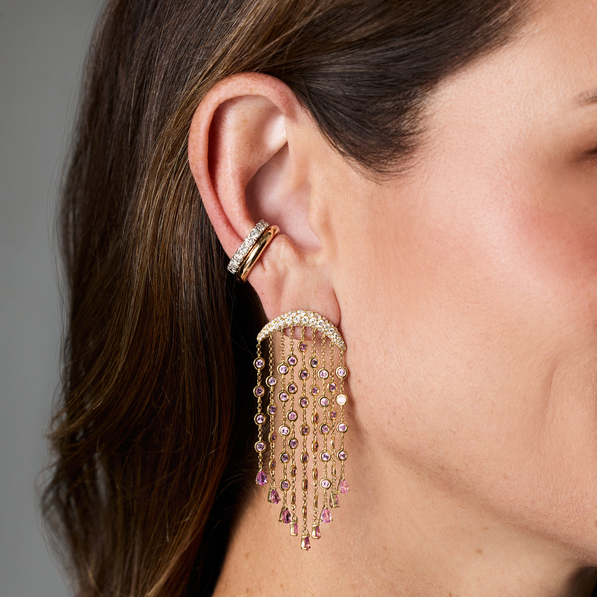 Nine Diamond Ear Cuff styled with diamond chandelier earring, on ear | JJ Jewelry Miami
