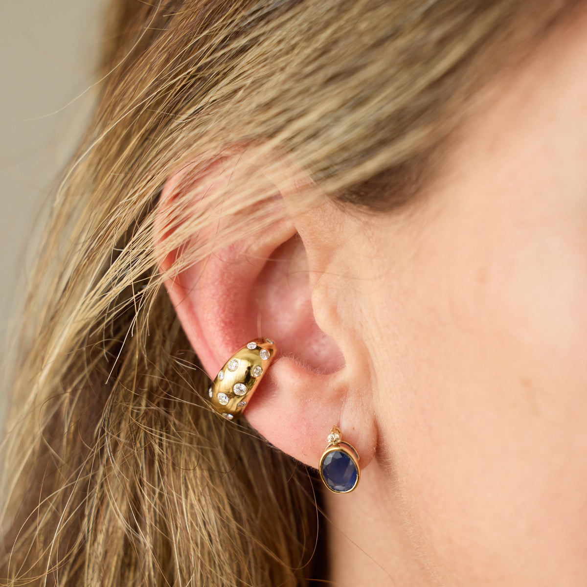 Oval Blue Sapphire Bezel Stud Earrings in 14K Yellow Gold