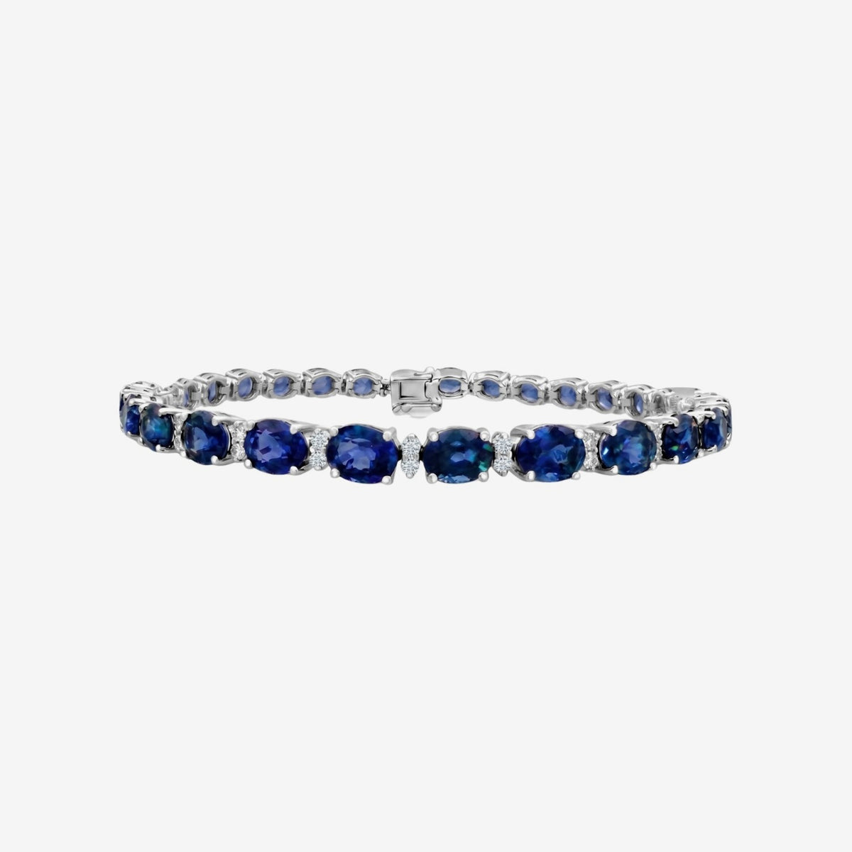 Oval Blue Sapphire and Diamond Line Bracelet in 18K white gold | JJ Jewelry