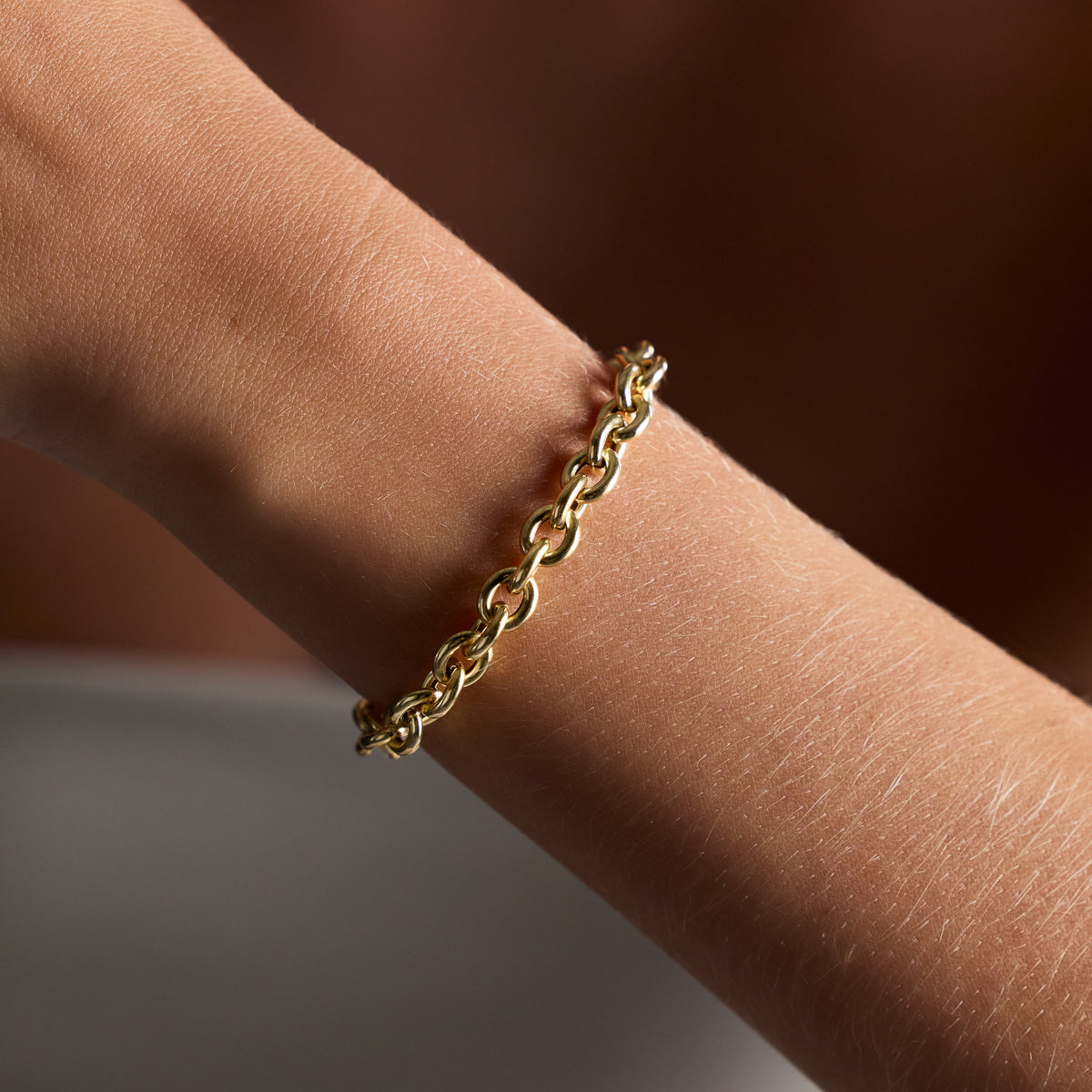 Oval Link Bracelet in 14K yellow gold, lifestyle view | JJ Jewelry