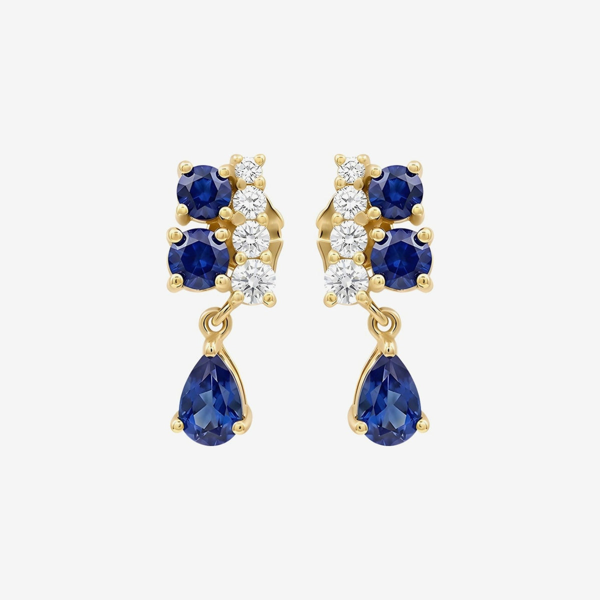Pear-Cut Gemstone Drop Earrings in 14K Yellow Gold with Blue Sapphire, gray background | JJ Jewelry Miami