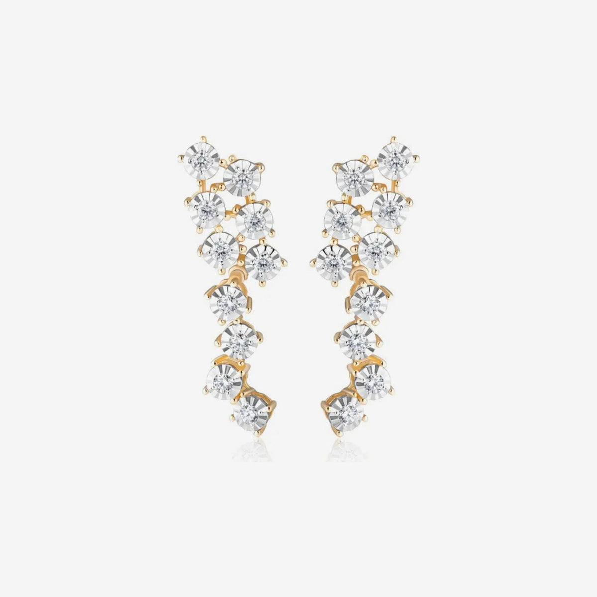 Round Brilliant Diamond Cascade Drop Earrings in 18K Yellow Gold, gray background | JJ Jewelry Miami