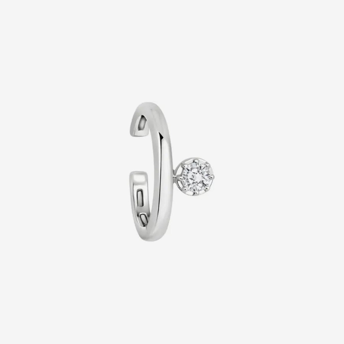 Single Diamond Ear Clip in 18K White Gold, gray background | JJ Jewelry Miami
