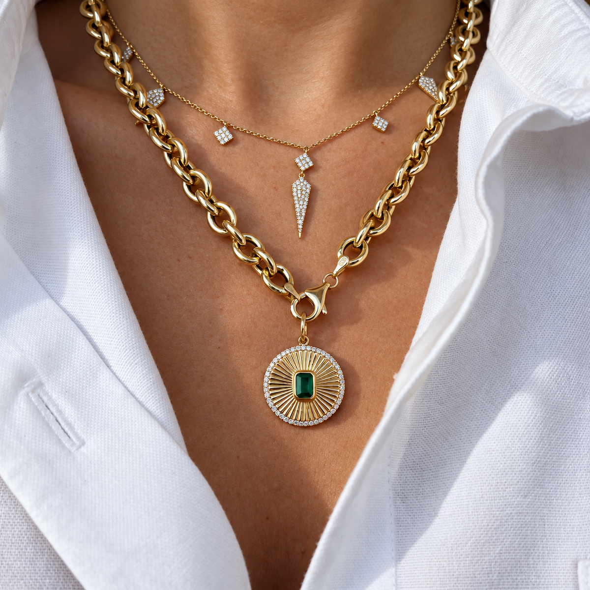 Fluted Emerald Disc Pendant with Diamonds in 14K Yellow Gold, layered on gold chains | JJ Jewelry Miami