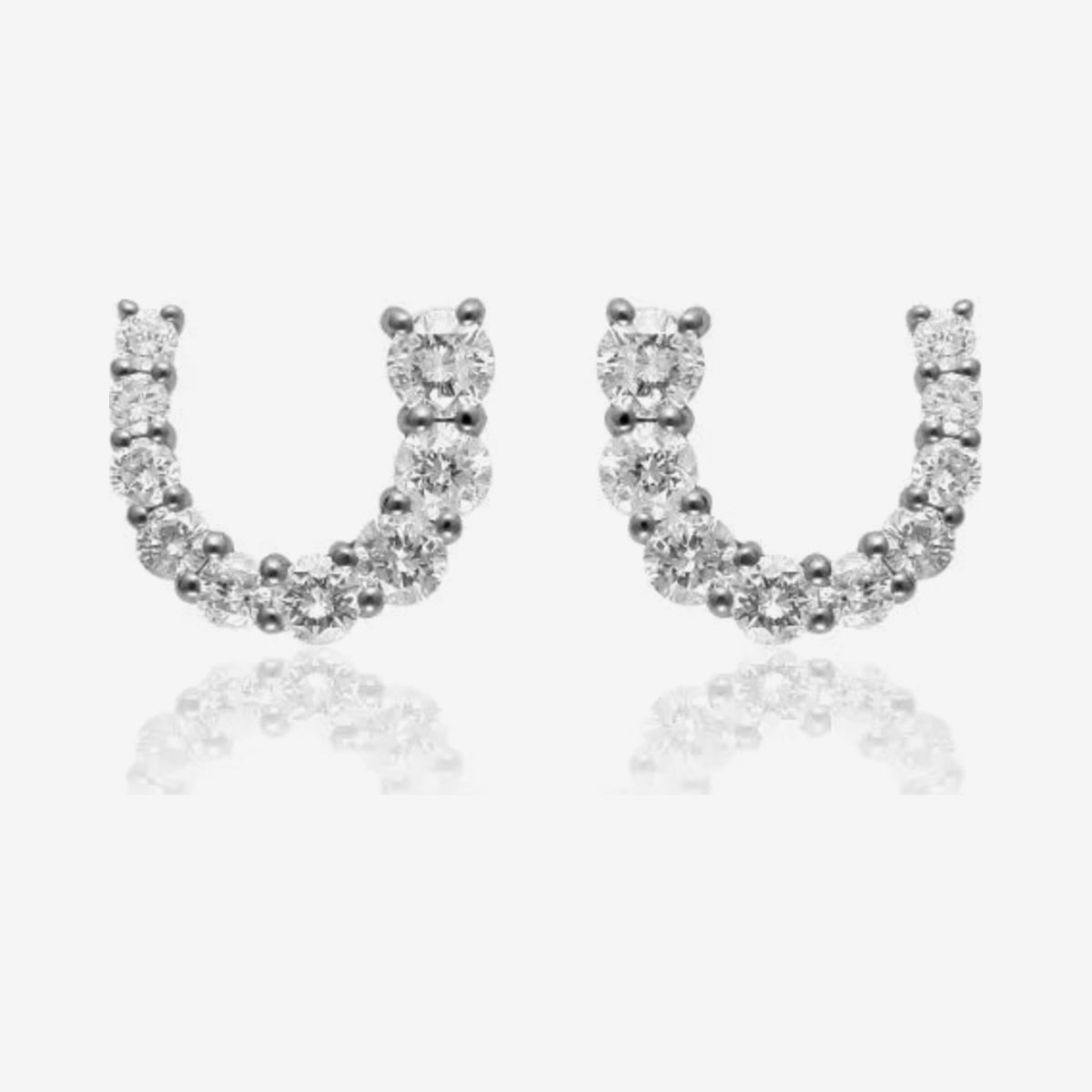 Horseshoe Diamond Stud Earrings in 18K White Gold, gray background | JJ Jewelry Miami